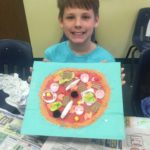 A Little Boy Holding a Pizza Artwork