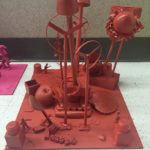 Sculpture using recycled objects in red color